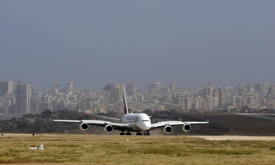 FILE - A double-decker Airbus A380 plane lands at the Rafik Hariri International Airport in Beirut, Lebanon, March 29, 2018. Lebanon's caretaker transportation minister on Thursday, March 30, 2023 said a contract for a new terminal at the country's main airport is cancelled, following criticism that no public bidding was held for the $122 million project. (AP Photo/Bilal Hussein, File)