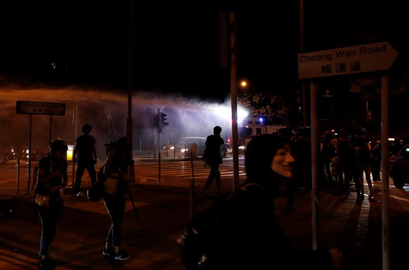 Police use a water cannon during an anti-government demonstration in Hong Kong