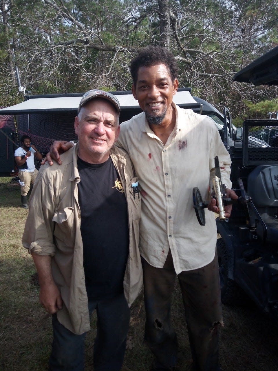 Bob Gillmor poses with actor Will Smith on the set of “Emancipation.”