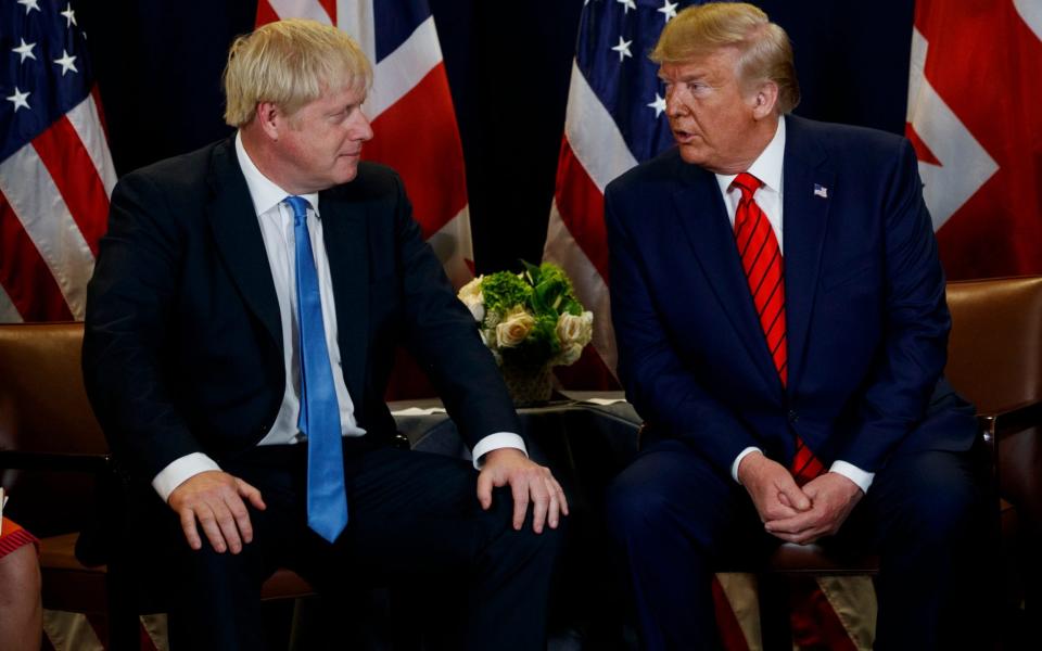 President Donald Trump meets with British Prime Minister Boris Johnson at the United Nations General Assembly in New York - AP