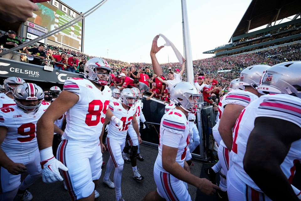 Oct 12, 2024; Eugene, Oregon, USA; The Ohio State Buckeyes take the field prior to the NCAA football game against the Oregon Ducks at Autzen Stadium