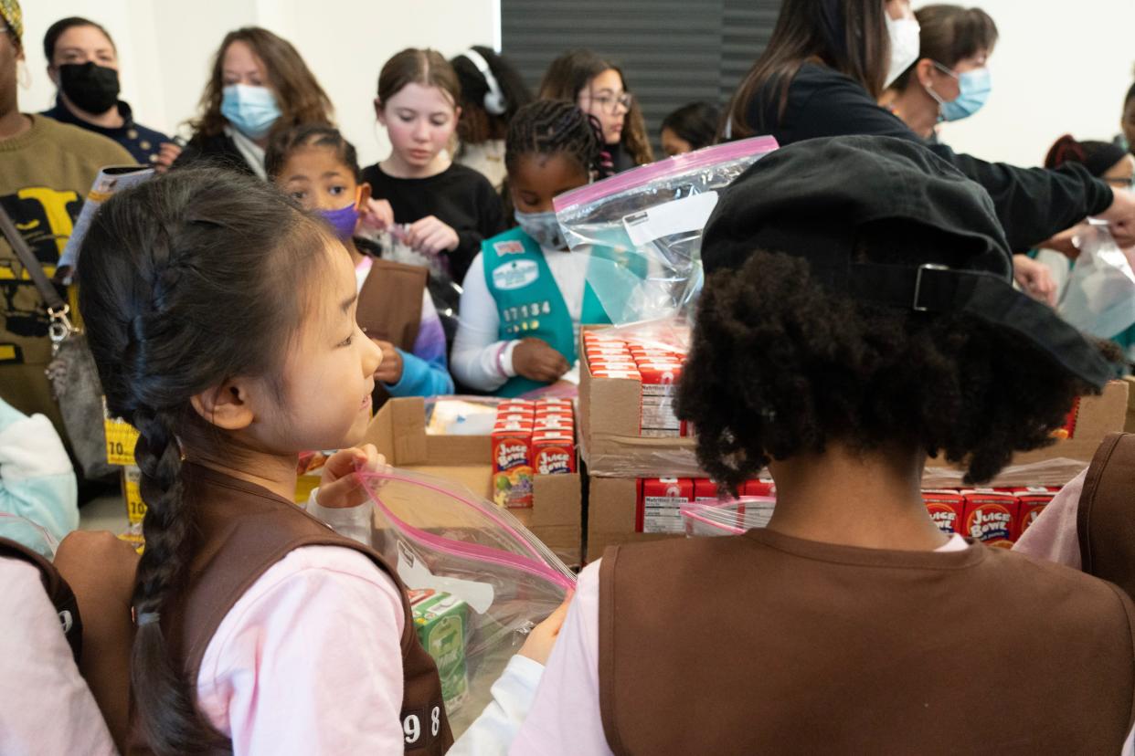 The Center for Food Action held a Day of Service Snack Pack Event on Martin Luther King, Jr. Day at Community Baptist Church in Englewood, N.J. on Monday Jan. 16, 2023. Volunteers put together snack in bags which will be distributed to the needy. 