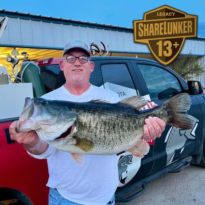 Scott Hines showing off his Legacy Class bass caught in O.H. Ivie