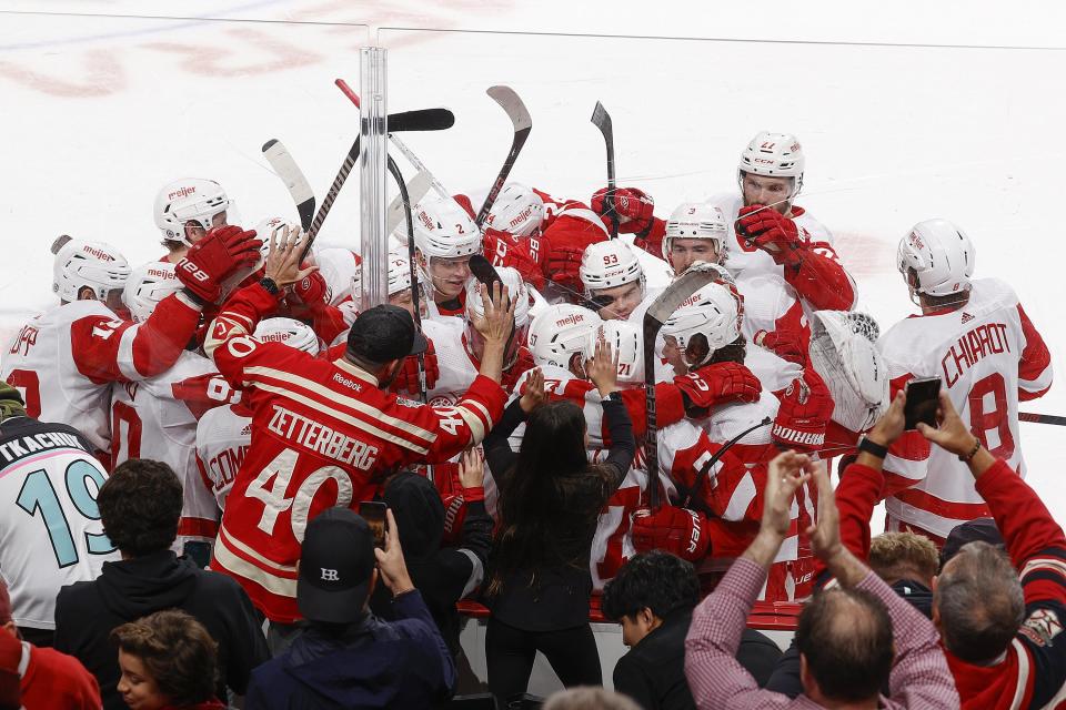 1933430826.jpg SUNRISE, FL - JANUARY 17: Teammates congratulate Dylan Larkin #71 of the Detroit Red Wings after he scored an overtime goal to defeat the Florida Panthers 3-2 at the Amerant Bank Arena on January 17, 2024 in Sunrise, Florida. (Photo by Joel Auerbach/Getty Images)