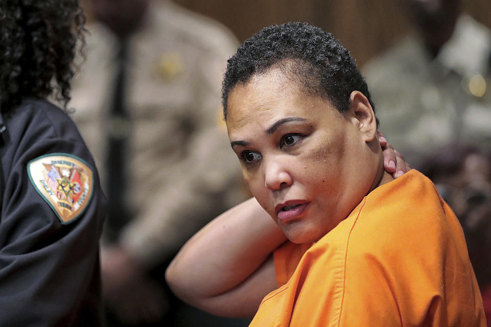 FILE - Sherra Wright listens as prosecutor Paul Hagerman reads a list of evidence against her during a hearing in Judge Lee Coffee's court in Memphis, Tenn., July 25, 2019. Billy Ray Turner is charged with conspiring with Sherra Wright to killer her ex-husband, retired NBA player Lorenzen Wright, whose body was found in a swampy field Memphis in 2010. (Jim Weber/Daily Memphian via AP, File)