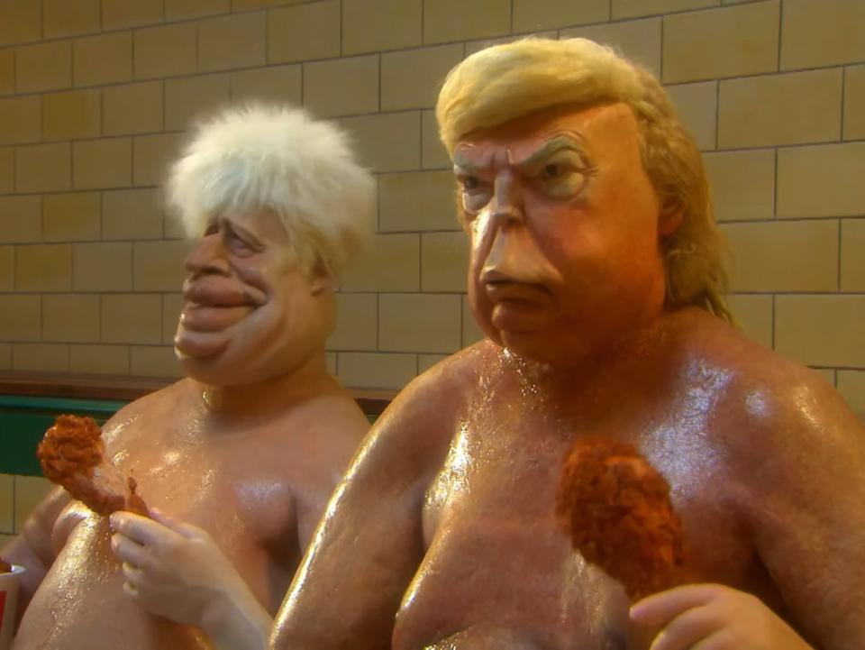 Puppets representing Donald Trump and Boris Johnson are depicted eating fried chicken in a saunaBritBox