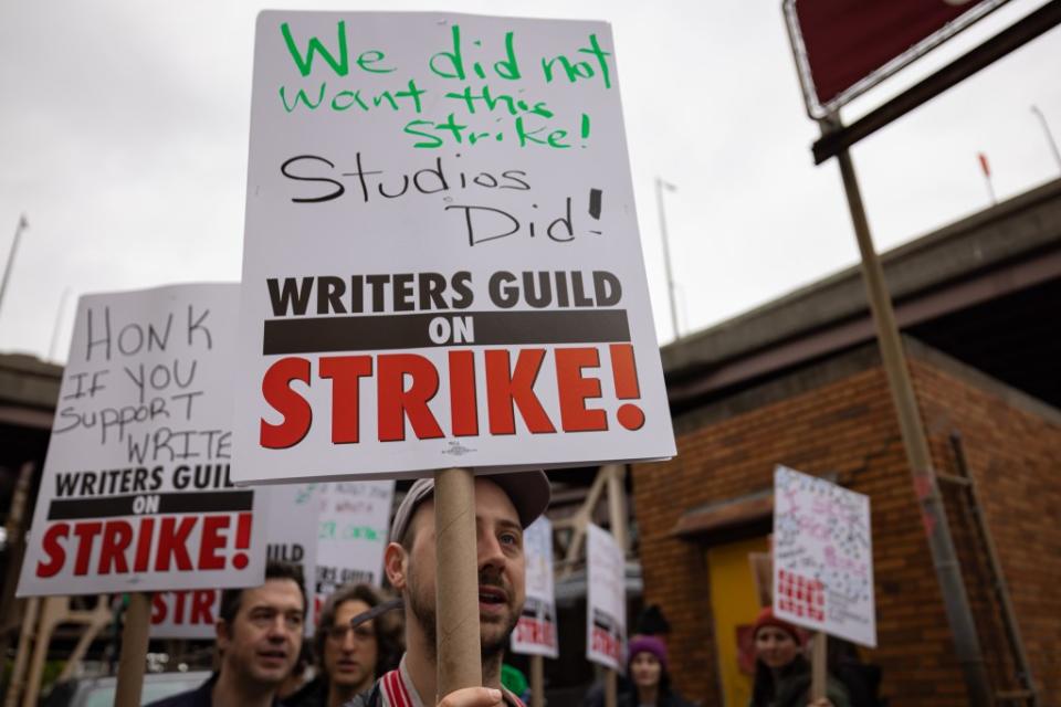 QUEENS, NEW YORK, UNITED STATES - 2023/05/04: Writers Guild of America members march on a picket line in front of Silvercup Studios. After contract negotiations failed, thousands of unionized writers voted unanimously to strike, bringing television production to a halt, and initiating the first walkout in 15 years. (Photo by Michael Nigro/Pacific Press/LightRocket via Getty Images)