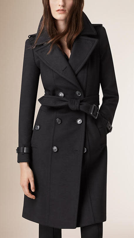 Find a statement coat: “For an all-over extra layer, go for a calf-length wool coat. Bonus points if you get one in a bold colour to set you apart amid a sea of dreary winter blacks and greys.” Leather Trim Wool Cashmere Trench Coat, $2,595 from ca.burberry.com