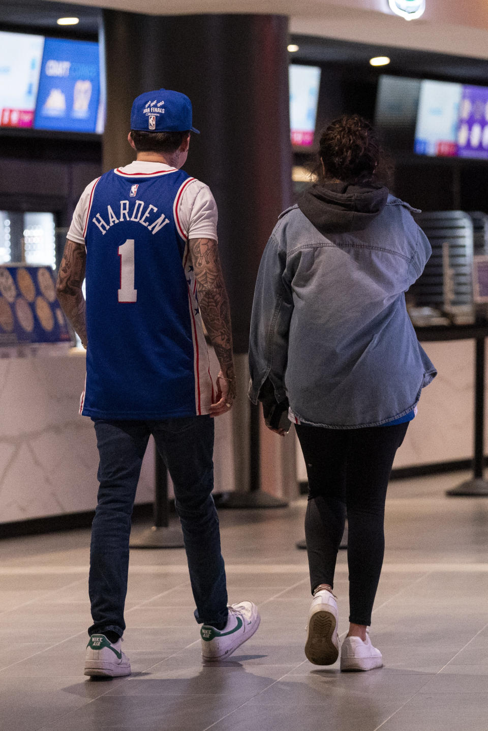 A Philadelphia 76ers fan wears a James Harden jersey prior to a preseason NBA basketball game against the Atlanta Hawks, Friday, Oct. 20, 2023, in Philadelphia. (AP Photo/Chris Szagola)