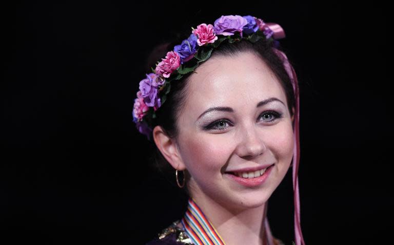 Elizaveta Tuktamysheva of Russia poses with her gold medal during the awards ceremony of the ladies free skating program of the 2015 ISU World Figure Skating Championships in Shanghai, on March 28, 2015