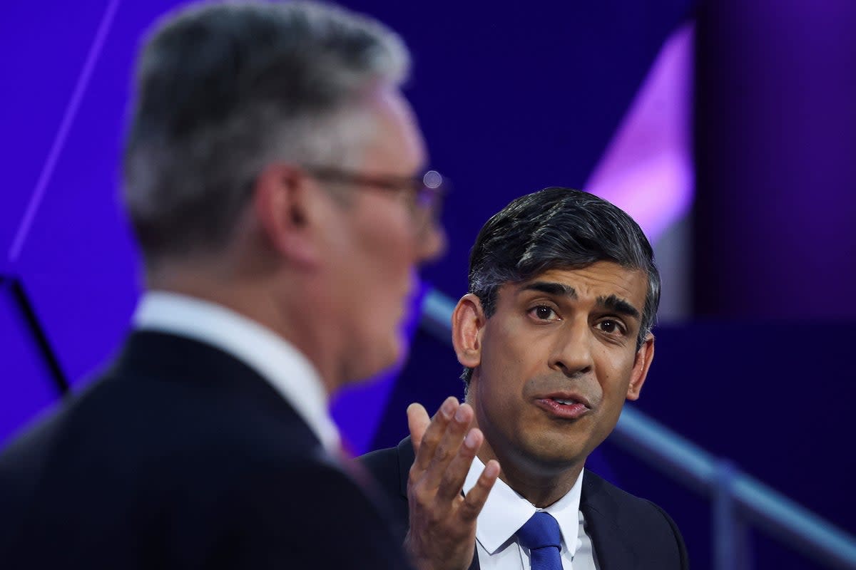 Britain's prime minister Rishi Sunak and opposition Labour Party leader Sir Keir Starmer take part in the BBC's Prime Ministerial Debate (Phil Noble/Pool via AP)