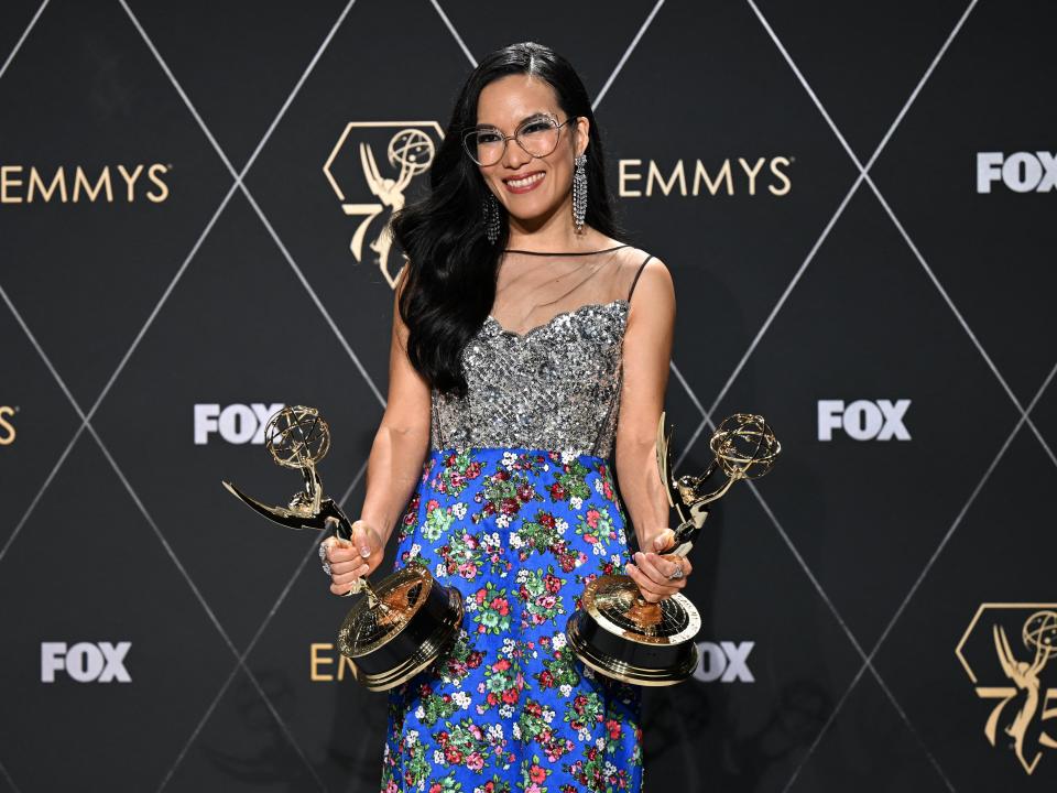 Ali Wong poses with her awards at the 75th Emmy Awards in 2024.