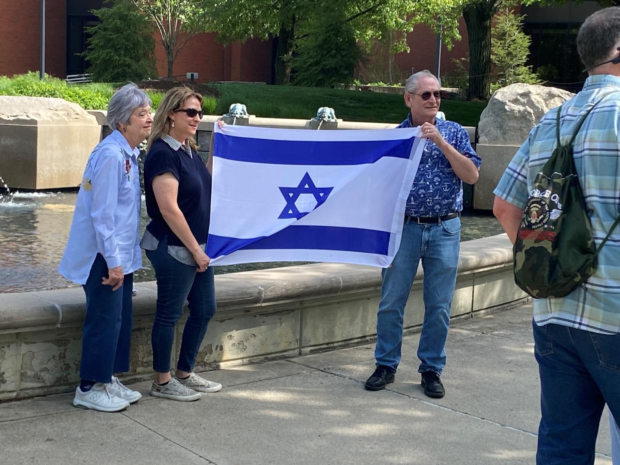 During a rally Wednesday, May 1, 2024, of pro-Palestinian protesters on the Ball State University campus, a small group gathered nearby to show their support of Israel. Lori Kate Lowenhar and Dallas Hopkins are shown displaying the Israeli flag.