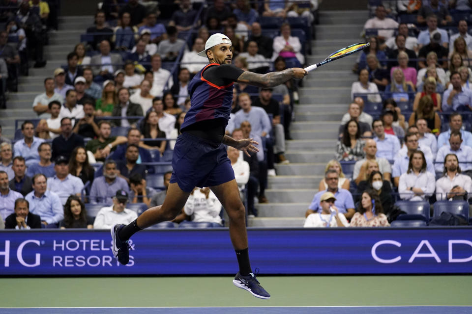 Nick Kyrgios, of Australia, returns to Karen Khachanov, of Russia, during the quarterfinals of the U.S. Open tennis championships, Tuesday, Sept. 6, 2022, in New York. (AP Photo/Charles Krupa)