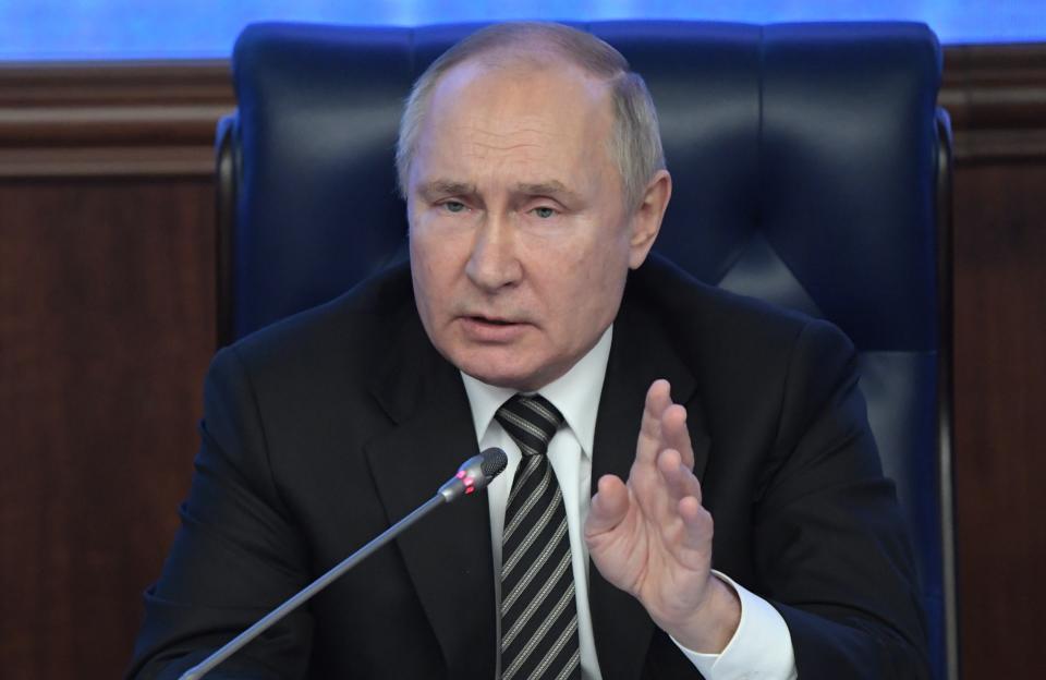 FILE - Russian President Vladimir Putin gestures while speaking at an extended meeting of the Russian Defense Ministry Board at the National Defense Control Center in Moscow, Russia, Dec. 21, 2021. (Sergey Guneyev, Sputnik, Kremlin Pool Photo via AP, File)