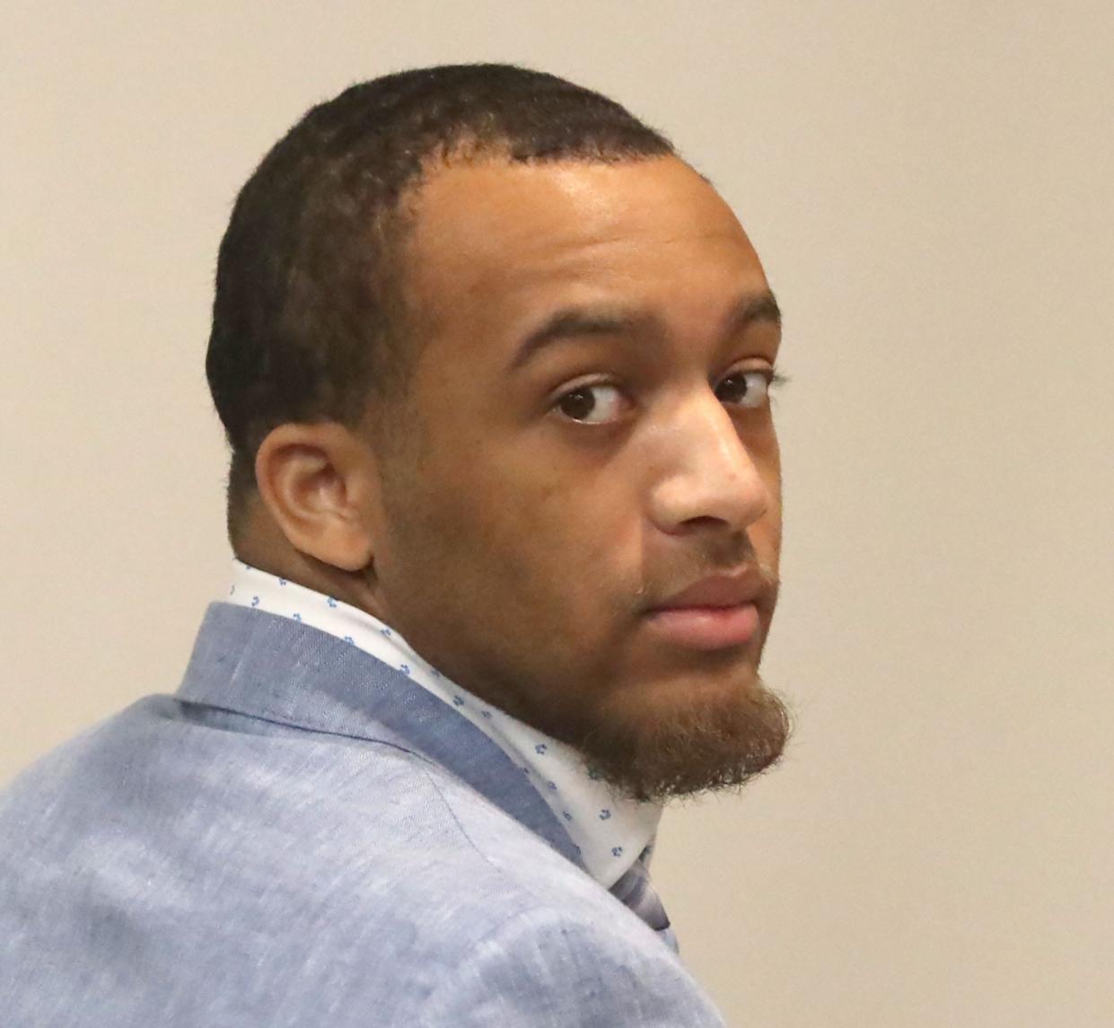 Damon Kemp, a former Bethune-Cookman University student, looks around the courtroom in the S. James Foxman Justice Center, Tuesday, May 23, 2023, during his trial for killing two people, including another B-CU student.