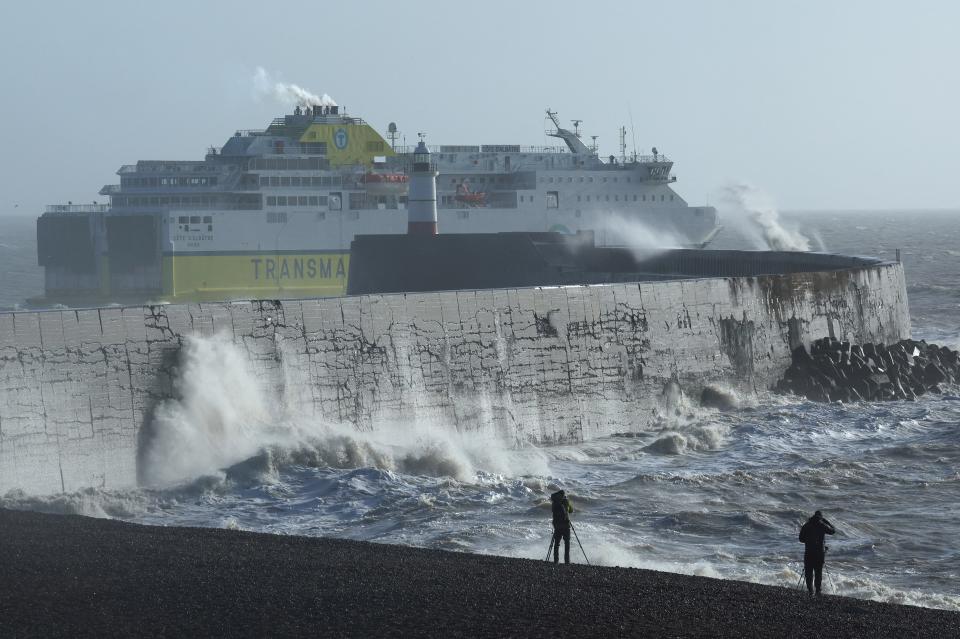 A cross-Channel ferry departs Newhaven for France as large waves hit the seawall and harbour during Storm Isha in Newhaven, southern Britain, (REUTERS)