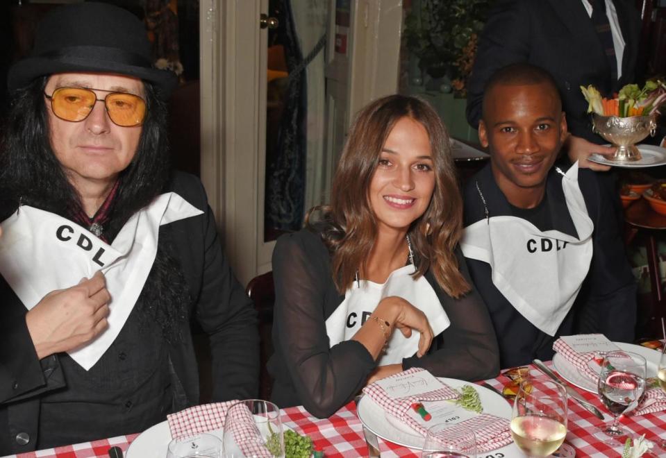 Swedish dinner parties are so full of life: Director Jonas Akerlund, Actress Alicia Vikander and Dancer Eric Underwood get ready to chow down (Photo by David M. Benett/Dave Benett/Getty Images for CDLP)