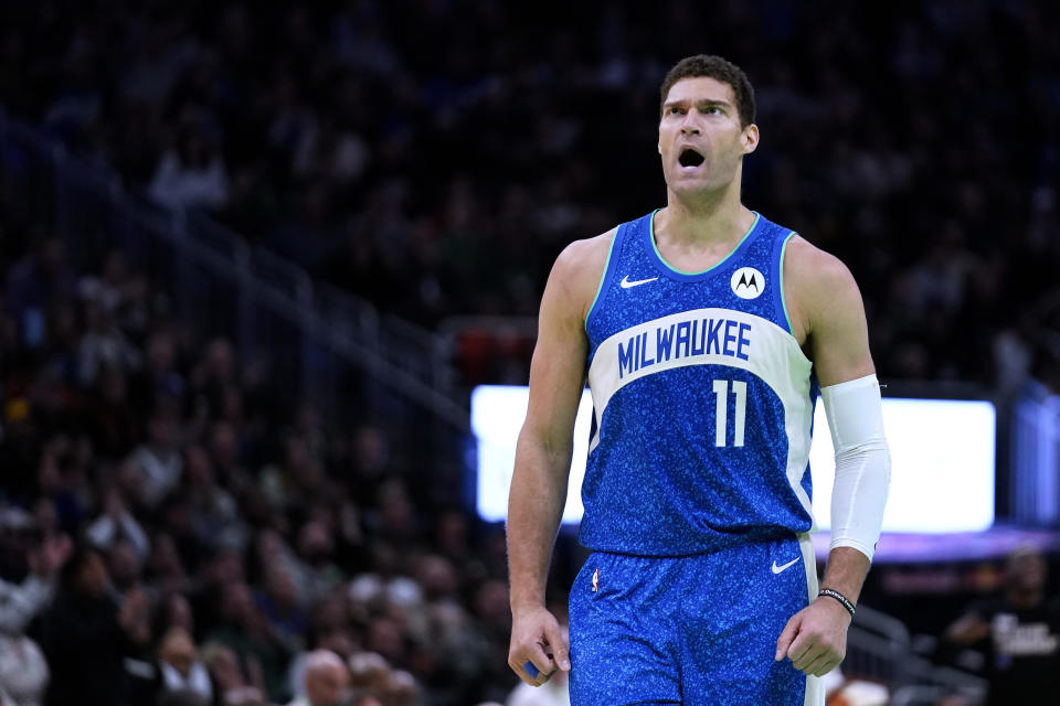 Milwaukee Bucks' Brook Lopez reacts during the second half of the team's NBA basketball In-Season Tournament game against the Washington Wizards on Friday, Nov. 24, 2023, in Milwaukee. (AP Photo/Aaron Gash)