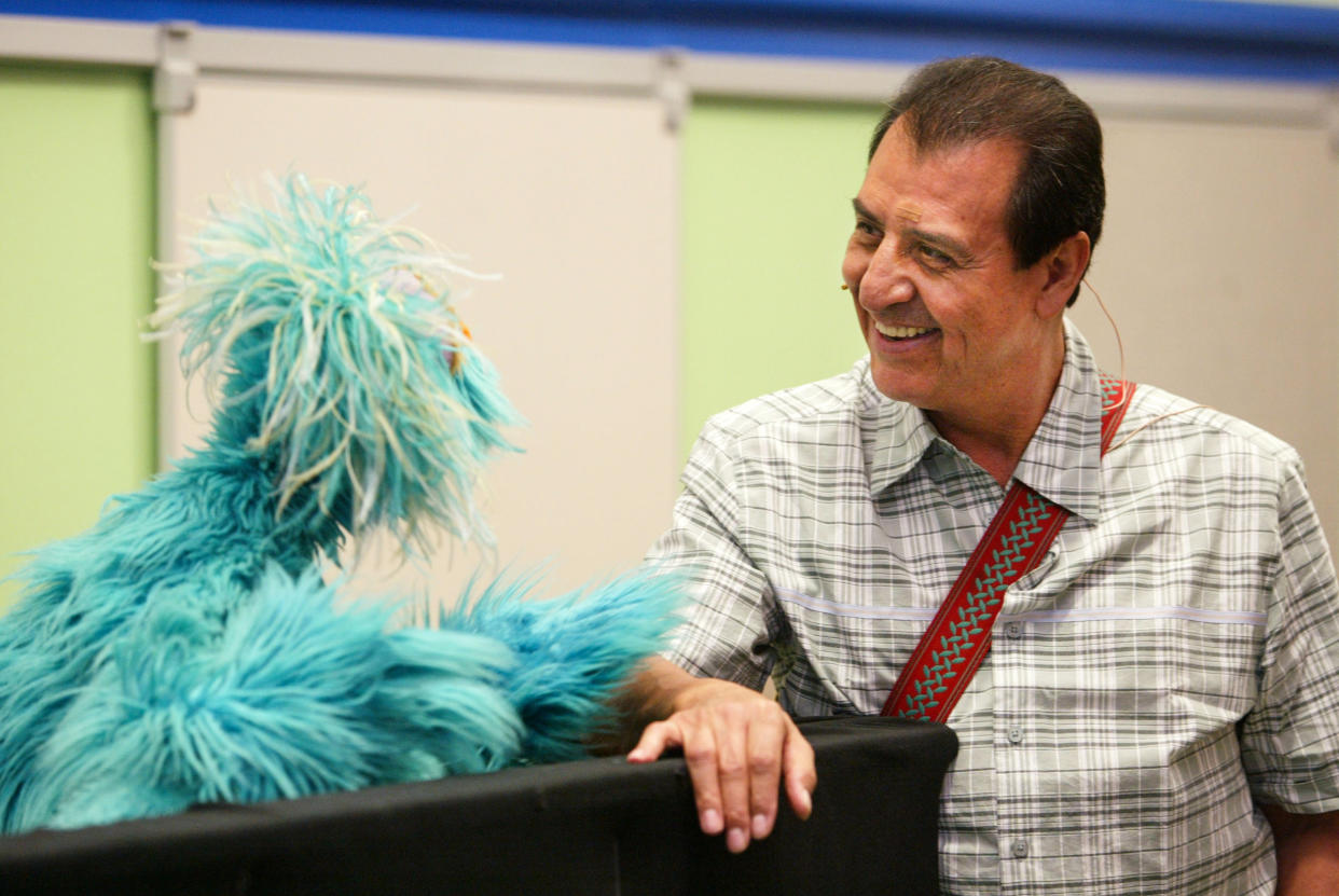 Rosita chats with Luis, played by Emilio Delgado, during Sesame Street's 