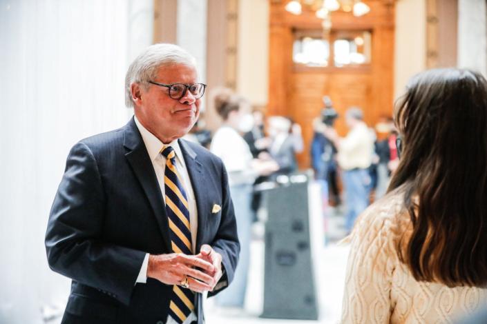 Indiana Sen. Ron Alting (R, Lafayette) encourages student Claire Curran to keep fighting for her beliefs after she and other student members of the &quot;Confront the Climate Crisis&quot; group spoke on legislative advocacy day, Jan. 18, 2022, at the Indiana Statehouse.  