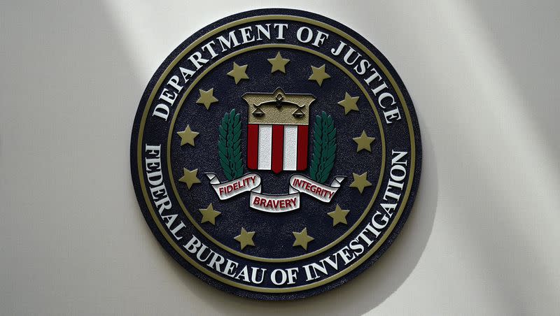 An FBI seal is seen on a wall on Aug. 10, 2022, in Omaha, Neb. New legislation proposed Tuesday would require the U.S. intelligence community to obtain a warrant before spying on Americans. 