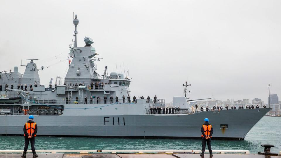 The frigate prepares to dock during the ceremonial homecoming of HMNZS Te Mana at Devonport Naval Base on July 8, 2022, in Auckland, New Zealand. (Dave Rowland/Getty Images)