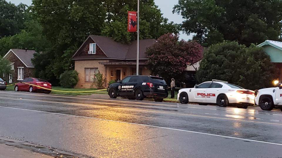 Law-enforcement officers blocked off more than one home Sunday in the 600 block of Main Street in Olney while investigating the murder of Manuela Allen as shown in this July 8, 2019, file photo.