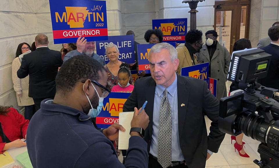 FILE - Jay Martin talks to reporters at the Arkansas state Capitol, Feb. 22, 2022, in Little Rock, Ark. (AP Photo/Andrew DeMillo, File)