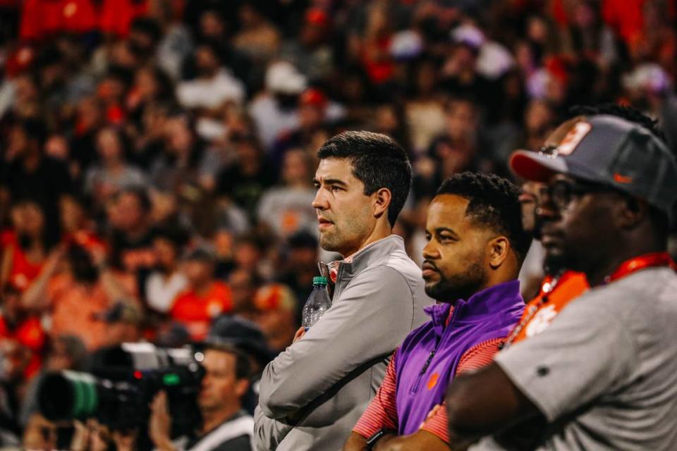 Clemson athletic director Graham Neff (far left) and deputy athletic director Kevin White (middle) at a Tigers football game Courtesy of Clemson Athletics