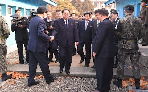 North Korean chief delegate Jon Jong-Su (C) crossing the border line before an inter-Korea working-level talks at the South side of the border truce village of Panmunjom in the Demilitarized zone dividing the two Koreas on January 17, 2018.  - Credit:  AFP