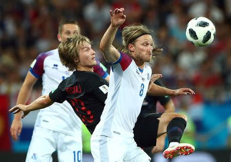 Soccer Football - World Cup - Group D - Iceland vs Croatia - Rostov Arena, Rostov-on-Don, Russia - June 26, 2018 Croatia's Tin Jedvaj in action with Iceland's Hordur Magnusson REUTERS/Hannah McKay