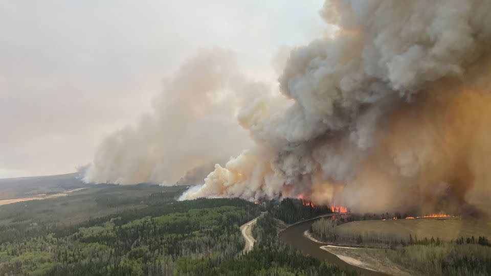 A smoke column rises from wildfire EWF-035 near Shining Bank, Alberta, Canada May 5, 2023. - Alberta Wildfire/Handout/Reuters