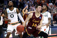 <p>Ben Richardson #14 celebrates after Donte Ingram #0 of the Loyola Ramblers makes his game-winning three pointer against the Miami Hurricanes in the first round of the 2018 NCAA Men’s Basketball Tournament at American Airlines Center on March 15, 2018 in Dallas, Texas. (Photo by Ronald Martinez/Getty Images) </p>