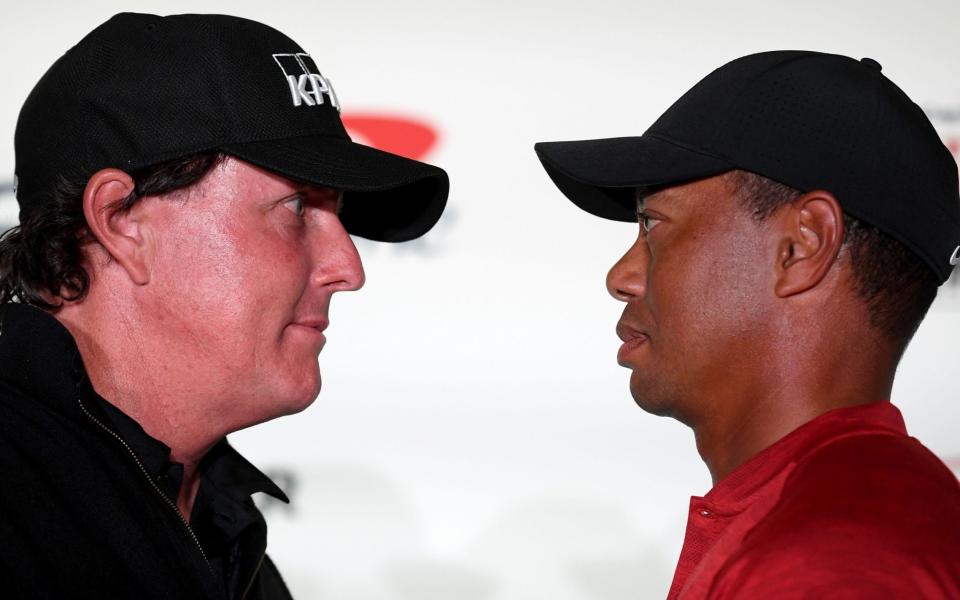 Phil Mickelson (left) will go head-to-head with Tiger Woods for the $9 million prize pot on Friday - Getty Images North America