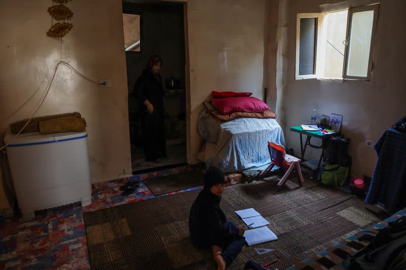 Wife and daughter of unemployed Lebanese Hussein Hamadeh are present inside their home, in Beirut