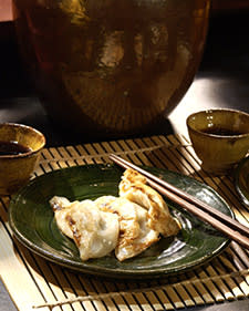 <div class="caption-credit"> Photo by: Martha Stewart</div><div class="caption-title">Serve Traditional New Year's Dishes</div>Teach young guests about traditional New Year's dishes from around the world, like these delicious-looking dumplings.