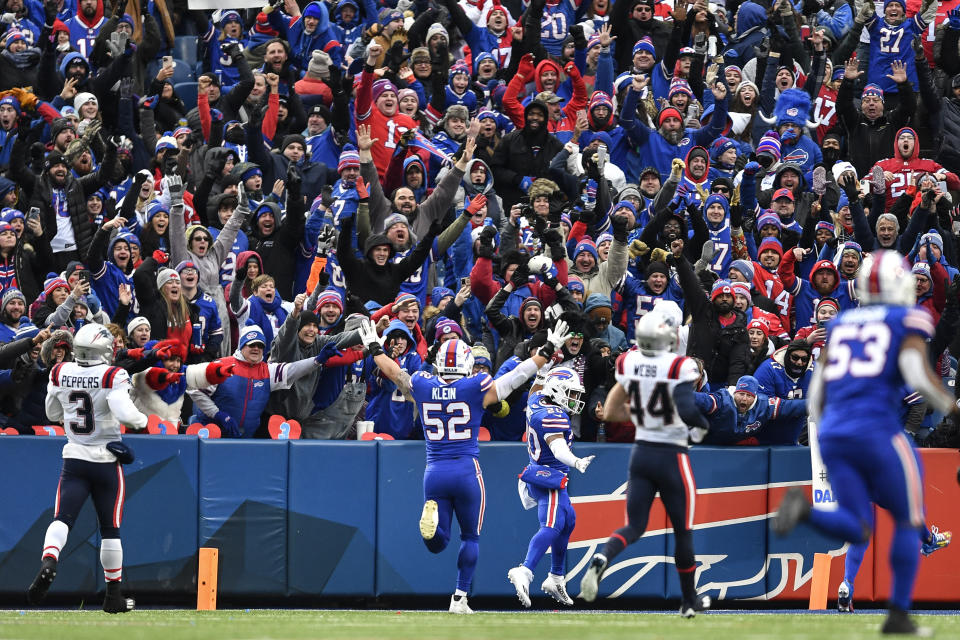 Buffalo Bills running back Nyheim Hines (20) celebrates after running in a touchdown on a punt return during the second half of an NFL football game against the New England Patriots, Sunday, Jan. 8, 2023, in Orchard Park. (AP Photo/Adrian Kraus)