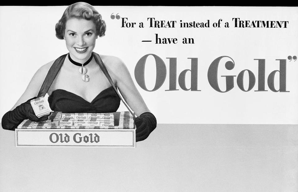 Grace Kelly carrying a tray of Old Gold cigarettes in a 1948 advertisement.