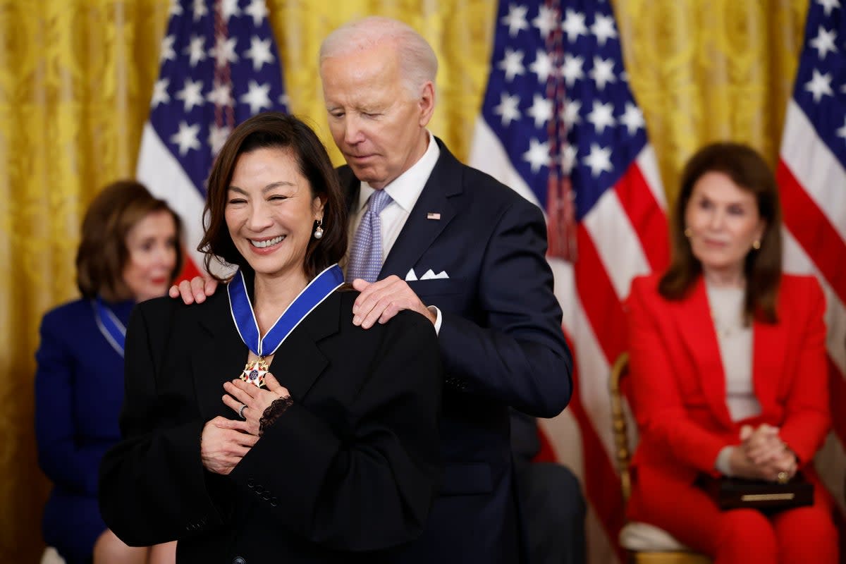 Joe Biden awards the Medal of Freedom to Actress Michelle Yeoh during a ceremony in the East Room of the White House on May 3, 2024 in Washington, DC (Getty Images)