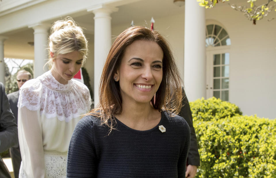 FILE - In this April 5, 2017 file photo, then White House Senior Counselor for Economic Initiatives Dina Powell, followed by Ivanka Trump, leaves a news conference in the Rose Garden at the White House in Washington. President Donald Trump says former aide Dina Powell is under consideration to replace departing U.N. Ambassador Nikki Haley. Powell served as deputy national security adviser to Trump for most of his first year in the White House, departing in mid-January. She previously worked for Goldman Sachs and served in President George W. Bush's administration. Trump told reporters Tuesday that he has heard his daughter Ivanka Trump's name discussed for the post. He says she'd be "incredible" in the role, but he knows if he selected her, he'd be accused of nepotism. (AP Photo/Andrew Harnik)