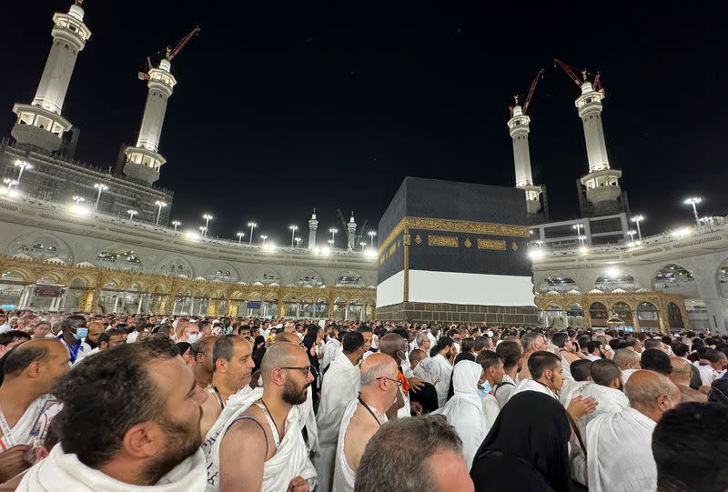 Pilgrims circle Kaaba in Mecca