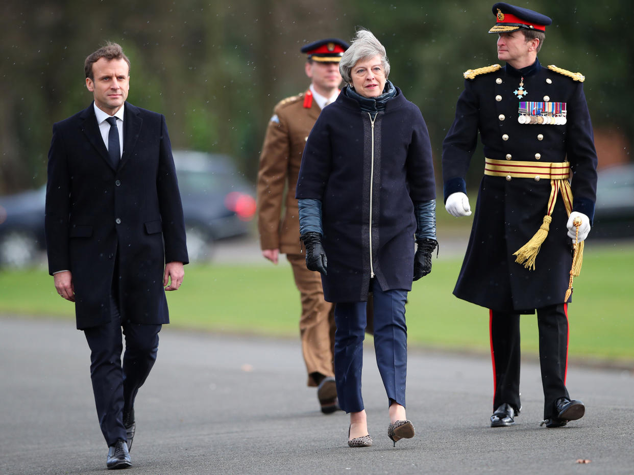 France's President Emmanuel Macron and Britain's Prime Minister Theresa May arrive at Sandhurst Military Academy: Reuters