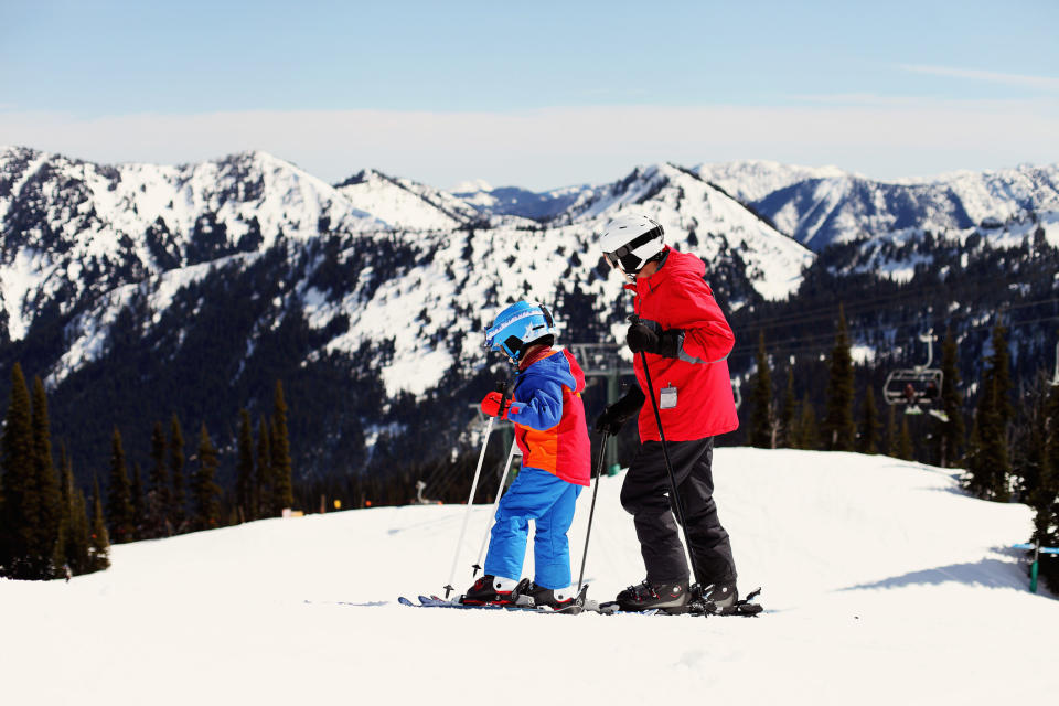 two people on a ski slope