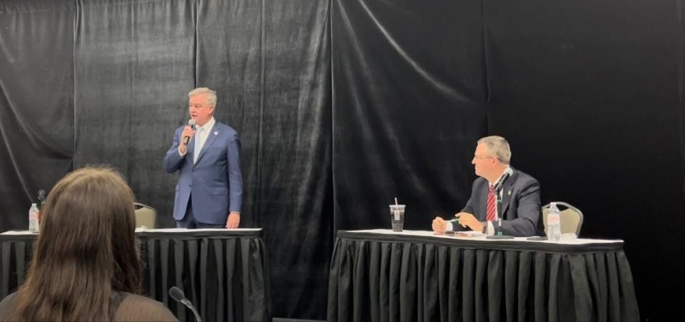 Maryland U.S. Rep. David Trone, D-6th, stands to speak during a congressional forum held at Frostburg State University on Oct. 24, 2022. Trone, the owner of Total Wine and More, defeated his opponent, state Del. Neil Parrott, R-Washington, at right, after all the votes were counted last November.