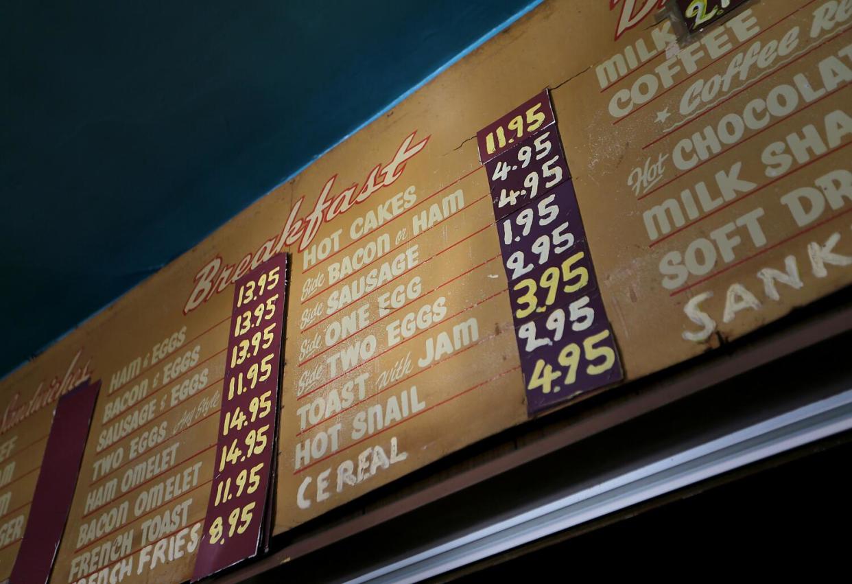 A simple menu hangs on the wall at the Silver Crest Donut Shop Restaurant and Bar in San Francisco.