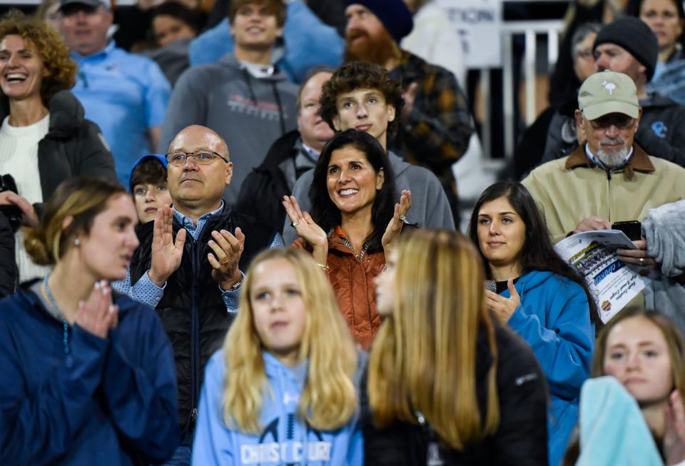 Nikki Haley, former Governor of South Carolina, center, cheers for Christ Church after a 43-20 win against Johnsonville after the A State Championship game at Benedict College in Columbia, S.C. on Friday, Dec. 2, 2022.