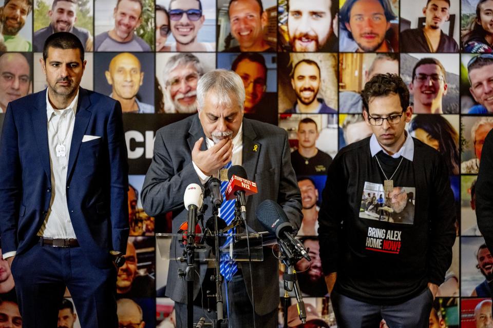 Israeli spokesperson for the Ministry of Foreign Affairs Lior Haiat (C) speaks during a press conference of the Israeli delegation after the first day of hearings on the genocide case against Israel brought by South Africa at the International Court of Justice, in The Hague on January 11, 2024. South Africa hopes that a landmark "genocide" case against Israel at the UN's top court will compel Israel to halt its military operations in Gaza.