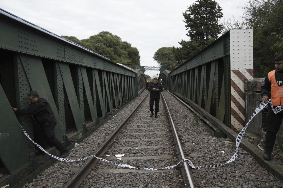 Police tape off the site after a passenger train collision in the Palermo area of Buenos Aires, Argentina, Friday, May 10, 2024. (AP Photo/Rodrigo Abd)