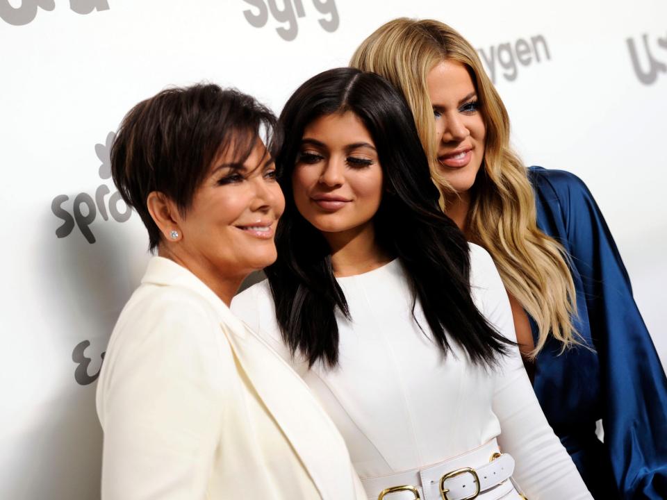 Kris Jenner stands with, from left, Kylie Jenner and Khloe Kardashian at the NBCUniversal Cable Entertainment event in 2015. The three are being sued by Rob Kardashian's former fiancee, Blac Chyna